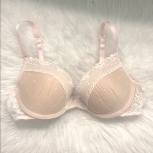 White laced nude colored push-up bra